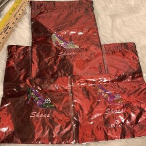 Package of three wine color shoe and/or lingerie drawstring bags